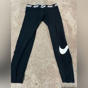 Nike Leggings with swoosh.